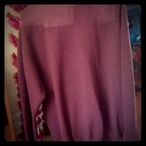 This is a purple sweater